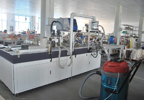 全自动打孔贴磁铁机